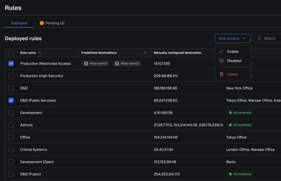 Firewall Rules table with two rules selected and the Bulk actions menu open on Enable, Disabled and Delete
